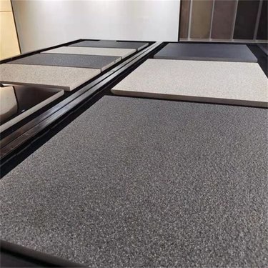 仿石材芝麻白荔枝面pc砖